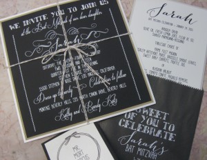 3-layer blackboard invite is tied with doubled bakers cord, dropping into an elegant 8 ½” square pearl mailer